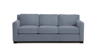 Blue elliot sofa with a subtle pattern on a white background